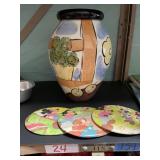 Vase & vintage Mickey Mouse wall decor.