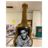 Elvis Plastic Guitar Shaped Bank. Approximately