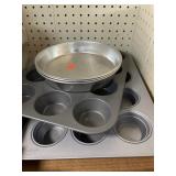 2 muffin pans & 3 round cake pans.