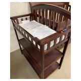 Wood changing table w/ pad. 43in back.  36in