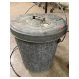 Wheeling. Locking (with bail) trash can.  17in