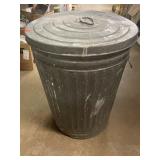 Metal trash can. 23in high x 18in diam.