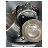 Lot of kitchen ware. Cookware.