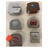 6 vintage tape measures. Some wi/ advertising.