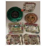 7 Souvenir Ash Trays.