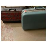 2 vintage suitcases.