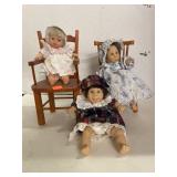 3 Small Baby Dolls band Two Wooden Chairs