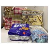 Baby Lot.  2 bags (diaper). Pkg Luvs.  3 sleepers