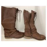Lace up boots.  Size 9