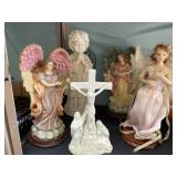 4 Angels & Jesus figurines.