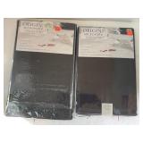 2 tablecloths.  60x102in oval. 60x84in oval.