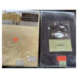 2 tablecloths. 90in diam. round. 60x84in oblong