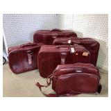 5 ct. Red Leather World Traveler Suitcase Set