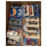 13 mostly Hot Wheels Collectable cars. In pkgs.