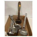 6 large kitchen / cooking utensils.  Including