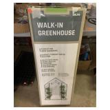 Walk in green house with shelving