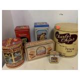 6 advertisement tins