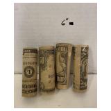 4 rolls of fake money