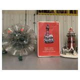 2 light house decor and Christmas light ball
