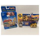 2 Hot Wheels sets. McDonalds and Action Machines