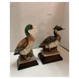 2 duck figurines