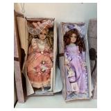 2 porcelain collectible dolls
