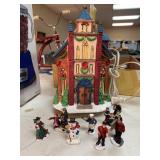 Christmas light up house and figurines