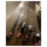 4 Fishing Rods / 3 w/ Reels