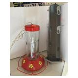 2 bird feeders. Hummingbird & finch.