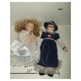 2 Cnt Porcelain Dolls 1 is Praying