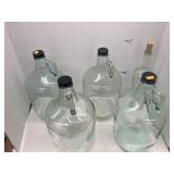 4 Glass Bottles & A Wine Bottle