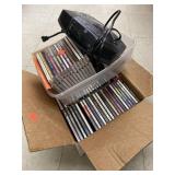 Box Of CDs and GE Alarm Clock/Radio