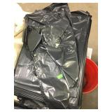 Stack of Large Black Trash Bags