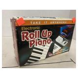 Vntg. Electronic Roll Up Piano