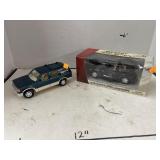 2 ct. - Die-Cast PT Cruiser & Ford Explorer (1:24