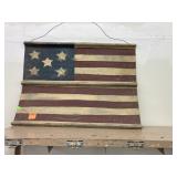 Metal siding painted flag wall hanging