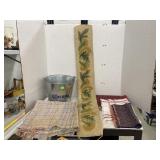 Woven placemats, rag rug, needlepoint hanging, &