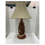 Hand carved wooden base lamp