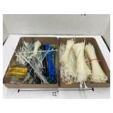 Flats of zip ties, twist ties, & floor trim