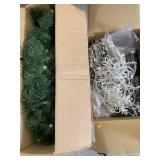 Wreath and Box of Christmas Lights
