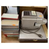 Slide projector and magazines