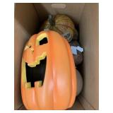Jack-o-lantern decor and pumpkins
