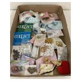 Flat of costume jewelry