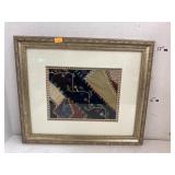 Framed quilt piece