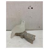 Stone carved dove figure