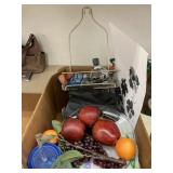 Faux fruit, shower shelf, shower head, etc