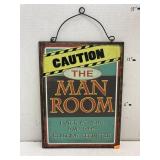 Man Room sign