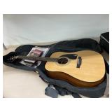Epiphone guitar, case, & educational tools