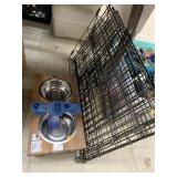 Dog crate and dishes