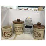4 Canisters